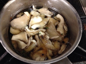 The oyster mushrooms poaching in beef fat. 